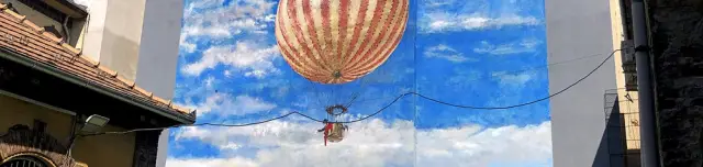 Szinyei Merse léghajója emelkedik fel a fővárosi házak közül